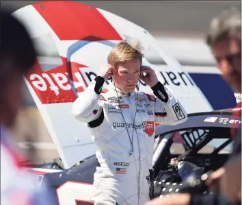  ?? Logan Riely / Getty Images ?? Tyler Reddick prepares to qualify on Saturday for the Ruoff Mortgage 500 at Phoenix Raceway in Avondale, Ariz.