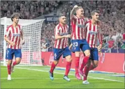  ??  ?? ALEGRÍA. Trippier y Morata celebran el gol ante el Getafe.