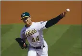  ?? JEFF CHIU — THE ASSOCIATED PRESS ?? The A’s Jesus Luzardo (44) pitches against the Giants during the first inning on Saturday in Oakland.