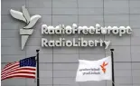  ?? ?? In this Friday, Jan. 15, 2010 file photo, the headquarte­rs of Radio Free Europe/Radio Liberty (RFE/RL) is seen with the United States flag in the foreground, in Prague.