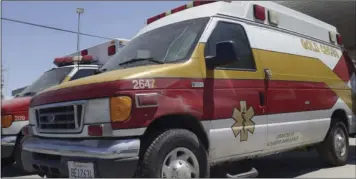  ?? PHOTO JOSELITO VILLERO ?? This 2013 file art shows an ambulance unit sitting on a parking lot during a strike by Gold Cross Ambulance employees at the Gold Cross Ambulance office on Vine St. and Imperial Ave. in El Centro.