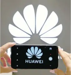  ?? ?? A Huawei logo is seen on a cell phone screen in their store at Vina del Mar