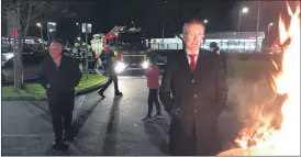  ?? ?? IFA President, Tim Cullinan, keeping vigil at the fire barrel at the recent IFA protest on increased farm returns at Dunnes Stores, Cork.