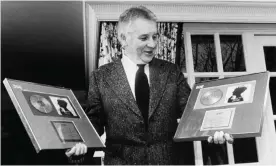  ?? Photograph: PA Images/Alamy ?? One-hit wonder … Henryk Górecki in 1993 with silver and gold discs of the Nonesuch recording of his Third Symphony.