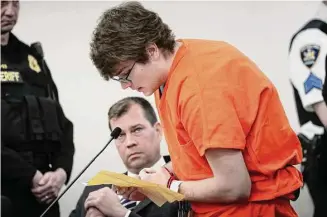  ?? Derek Gee/Associated Press ?? Gunman Payton Gendron reads an apology to the court at his sentencing before Erie County Court Judge Susan Eagan on Wednesday in Buffalo, N.Y. Gendron, a white supremacis­t who killed 10 Black people at a Buffalo supermarke­t was sentenced to life in prison without parole.