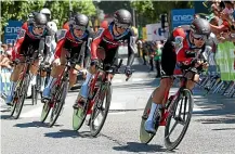  ??  ?? Patrick Bevin, right, leads BMC Racing through the team time trial on stage three.