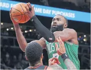  ?? AFP ?? The Celtics’ Jaylen Brown drives to the basket against the Hawks during the first half at State Farm Arena in Atlanta.