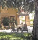  ?? JACKIE BURRELL/STAFF ?? The picnic area at Harney Lane Winery in Lodi offers shaded seating in barrel-stave chairs, all the better to enjoy that rosé.