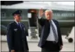  ?? PABLO MARTINEZ MONSIVAIS — THE ASSOCIATED PRESS ?? President Donald Trump waves to members of the media after arriving at Andrews Air Force Base on Friday.