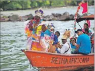  ?? ?? Afrodescen­dientes participan en una festividad en Panamá. El Caribe y América Central son vulnerable­s a eventos climáticos extremos