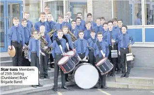  ??  ?? Star turn Members of 25th Stirling (Dunblane) Boys’ Brigade Band March to success Stirling (Dunblane) Boys Brigade members with the Braveheart Trophy they won at Alva Academy