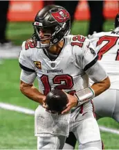  ?? Danny Karnik / Associated Press ?? By throwing for 320 yards in the second half last week against the Falcons, the Bucs’ Tom Brady has exceeded 300 yards in three of the past four games.