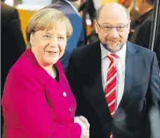  ?? Foto: Reuters ?? Jednání začalo Šéfka křesťanský­ch demokratů Angela Merkelová a vůdce socialistů Martin Schulz zkoušejí dohodnout velkou koalici.