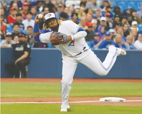  ?? DAN HAMILTON/USA TODAY SPORTS ?? Toronto Blue Jays third baseman Vladimir Guerrero Jr. has struggled on defence lately, but has been getting better overall, says manager Charlie Montoyo