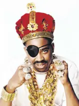  ?? ?? Slick Rick wearing a crown encrusted with gemstones.