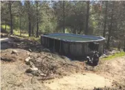  ??  ?? The deck and pool at Mark and Susan Bowe’s Calaveras County home commanded a serene mountain view. The pool and deck burned in the 2015 Butte Fire.