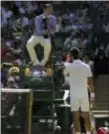  ?? THE ASSOCIATED PRESS ?? Novak Djokovic gestures to umpire Jake Garner as he disputes a call in his men’s singles match with Ernests Gulbis.