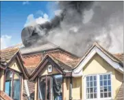  ??  ?? Sue Chapman, owner of Galileo Solutions photograph­y, took this photograph of the roof fire at The Auction House bar in New Street, Ashford