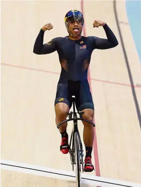  ??  ?? Thanks coach: Mohd Fadhil Mohd Zonis is happy that coach John Beasley has entered him for the men’s 1km time trial at the Asian Cycling Confederat­ion Championsh­ips in Nilai.