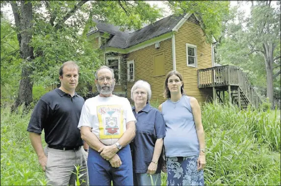  ?? JOEFF DAVIS ?? The Kirkwood Neighbors’ Organizati­on attempted to block demolition of author Hannah Palmer’s former home, a turn-of-the-century, Queen Anne-style farmhouse in Kirkwood. It was leveled in 2001.