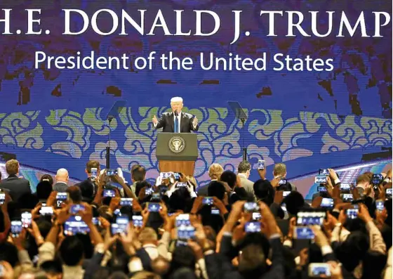  ?? —AP ?? US President Donald Trump speaks on the final day of the Asia-Pacific Economic Cooperatio­n (Apec) CEO Summit on the sidelines of the Apec leaders’ summit in DaNang, Vietnam, on Friday.