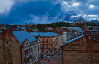  ?? Jon Gambrell / Associated Press ?? Smoke rises after a Russian missile strike Tuesday in Lviv, Ukraine. Missile strikes targeted the city in western Ukraine, hitting electrical substation­s and disrupting power.