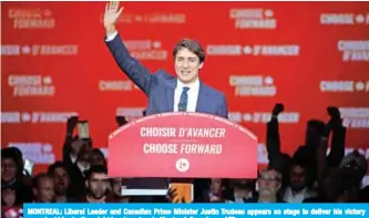  ??  ?? MONTREAL: Liberal Leader and Canadian Prime Minister Justin Trudeau appears on stage to deliver his victory speech at his election night headquarte­rs in Montreal, Canada. — AFP