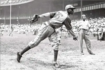  ?? AP FILE ?? Satchel Paige was one of baseball’s best pitchers in the Negro Leagues. Later in his career he pitched in the majors.