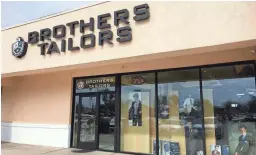  ?? CHRISTINA ESTES/KJZZ ?? Brothers Tailors opened this shop near Tatum and Thunderbir­d in 1994.