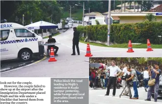  ??  ?? Police block the road leading to Najib's residence in Kuala Lumpur yesterday, while foreign and local journalist­s (inset) wait in the area.