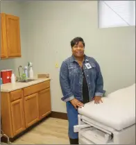  ?? MARK BUFFALO/THREE RIVERS EDITION ?? Patrica Henderson, administra­tor for the Jacksonvil­le Health Unit, stands in one of the remodeled examinatio­n rooms, part of a $600,000 expansion that includes a new waiting area for patients.