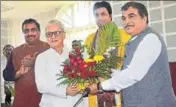 ??  ?? Union minister Nitin Gadkari greets Jishnu Debbarma, with Tripura CM designate Biplab Deb (second from right) and BJP general secretary Ram Madhav (left) in Agartala on Tuesday. PTI PHOTO
