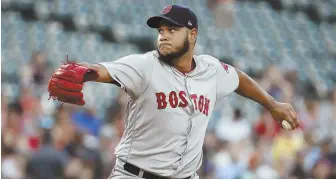  ?? AP PHOTO ?? WINNING FORM: Eduardo Rodriguez allowed eight hits over 52 innings last night, but still got the victory as the Red Sox held off the Orioles, 6-4, in Baltimore.