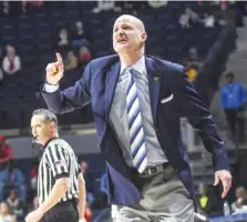  ?? ASSOCIATED PRESS FILE PHOTO ?? Andy Kennedy stepped down Sunday as Ole Miss basketball coach, having guided the Rebels to a 245-156 record and to nine 20-win seasons.