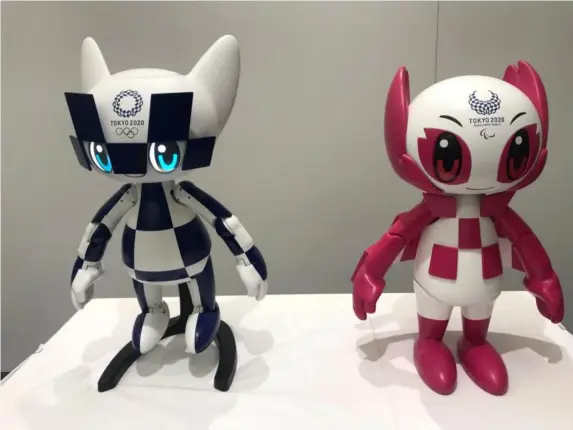  ?? (AP) ?? Mascots Miraitowa and Someity are hoped to put Japan’s tech back on the map