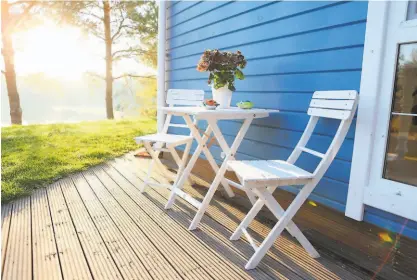  ?? Shuttersto­ck ?? A patio to relax and enjoy the scenery can be one of the benefits of living in a rural area.