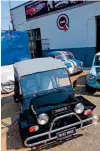  ??  ?? TOP A happy sight – classic Minis looking for new owners.RIGHT Graham and Andrew Bergan run the show.