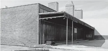  ?? [PHOTO BY MATT BARNARD, TULSA WORLD] ?? The building at 818 S. Detroit Ave., the former Standard Parts Warehouse from the 1940s, is being converted into office space.