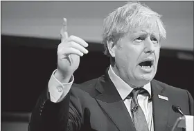  ?? AP/CHRISTOPHE­R FURLONG ?? British Prime Minister Boris Johnson, giving a speech Friday in Rotherham, England, was interrupte­d by a heckler who urged Johnson to sort out “the mess” he created when he shut down Parliament.