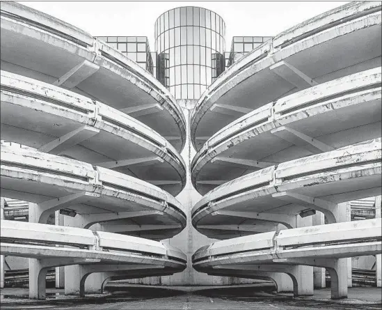  ?? Ludovic Maillard ?? THE CONCRETE Noisy-le-Grand Car Park in Noisy-le-Grand, France, follows a symmetrica­l plan based on double helicoids with radial cantilever­ed columns.