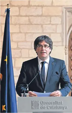  ?? Picture: AP. ?? In an address, Mr Puigdemont said the regional parliament will decide how to respond to the takeover plan.