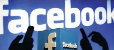  ??  ?? Facebook this month revealed that suspected Russian trolls purchased more than $100,000 worth of divisive ads on its platform during the 2016 election cycle. (Reuters)