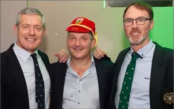  ??  ?? 1993 Lions captain Gavin Hastings presenting Nick Popplewell with his Lions Cap from the 1993 tour with incoming Greystones RFC president Victor Megannety.