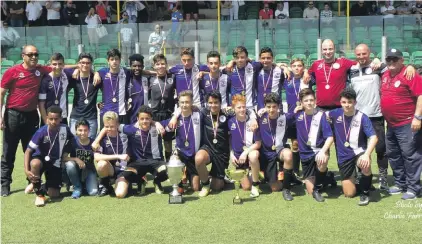  ?? Photo: Charlie Farrugia ?? St Andrews players and staff celebratin­g after winning the final