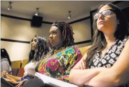  ??  ?? UNLV students listen as Edward Hinck, professor at the College of Communicat­ion & Fine Arts at Central Michigan University, talks about politeness in presidenti­al debates Thursday during a session of UNLV’s Presidenti­al Debate Lecture Series.