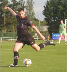  ??  ?? Central defender Ross Kenny clearing his lines in the first-half of Friday’s local derby. Photograph: John Harpur.