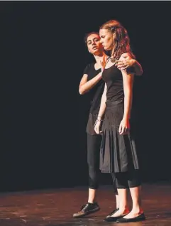  ??  ?? CENTRE STAGE: Emma McMullen and Holly Cummings from Peace Lutheran College perform at Shakefest 2018.