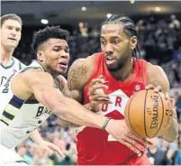  ?? FRANK GUNN THE CANADIAN PRESS ?? Kawhi Leonard has the Toronto Raptors just one win from the NBA final after Thursday night’s 105-99 win in Milwaukee.