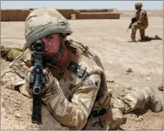  ??  ?? „ L/cpl David Timmins serving in Helmand Province, Afghanista­n, where he lost his eye in an explosion during operation Panther Claw in 2009.