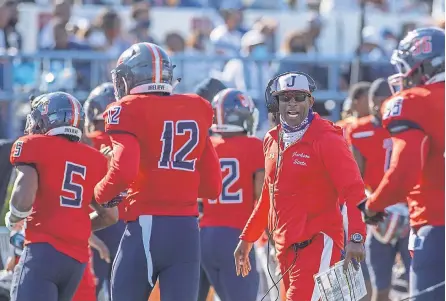  ?? BARBARA GAUNTT/ THE CLARION LEDGER ?? Jackson State first- year coach Deion Sanders shouts directions to his players during their April 3 home football game against Southern.